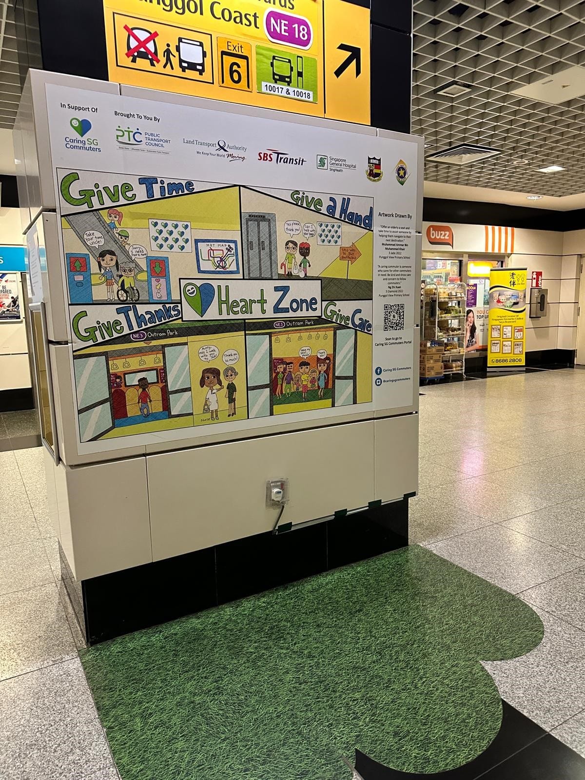 Heart Zone signage at Outram Park promoting kindness and assistance for commuters to Singapore General Hospital.